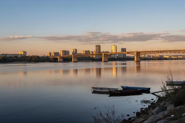Dnipro cityscape and river at golden hour